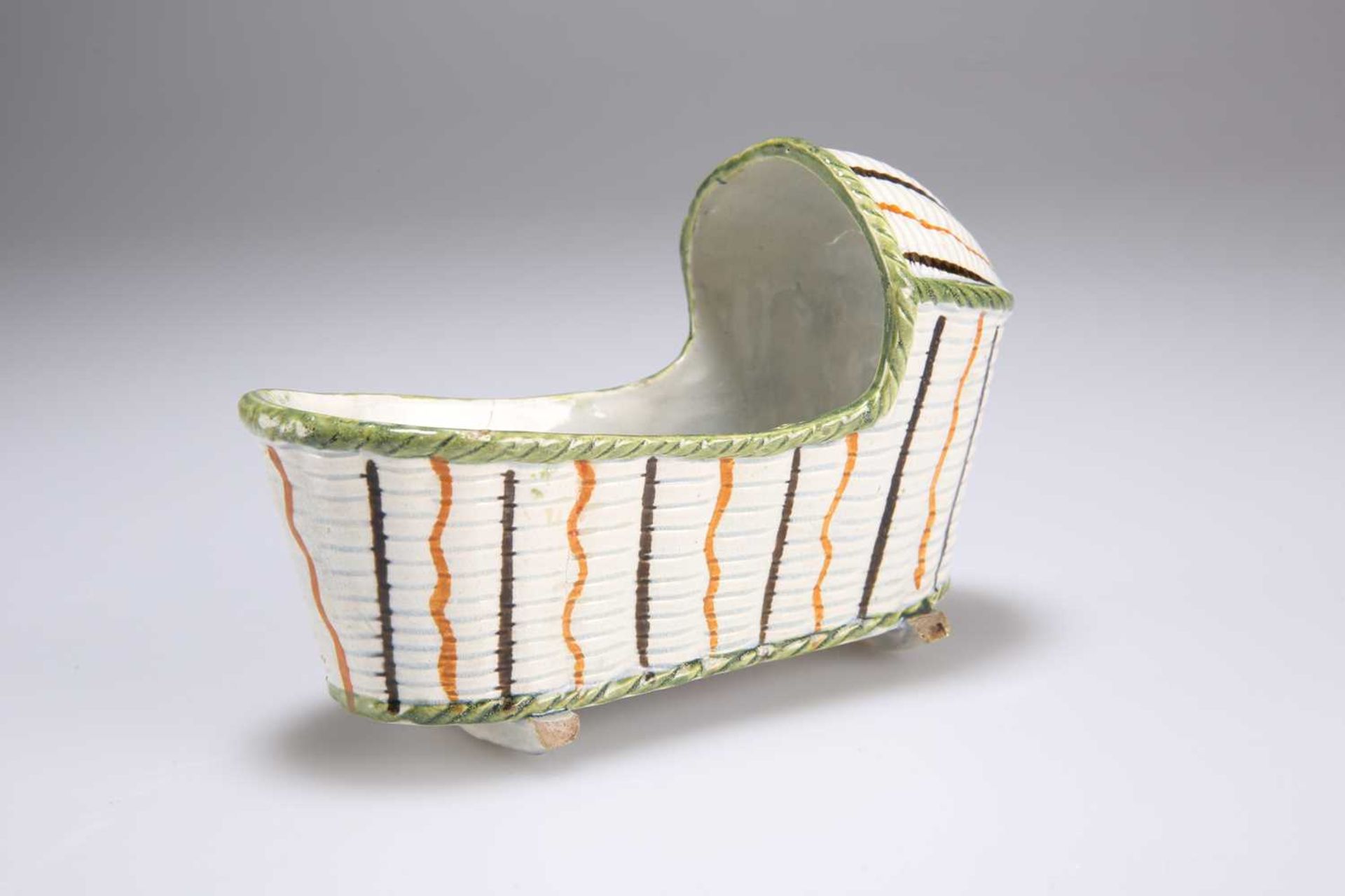 A PRATT WARE MODEL OF A CRADLE, CIRCA 1800