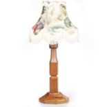 COLIN ALMACK OF SUTTON-UNDER-WHITESTONECLIFFE, A BEAVERMAN OAK TABLE LAMP