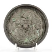 A CHINESE ARCHAISTIC BRONZE CIRCULAR MIRROR, QING DYNASTY