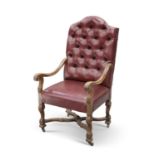 A 19TH CENTURY LEATHER UPHOLSTERED OAK ARMCHAIR