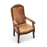 A CARVED AND STAINED BEECH LEATHER UPHOLSTERED CHILD'S ARMCHAIR