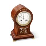 AN ART NOUVEAU INLAID MAHOGANY MANTEL CLOCK