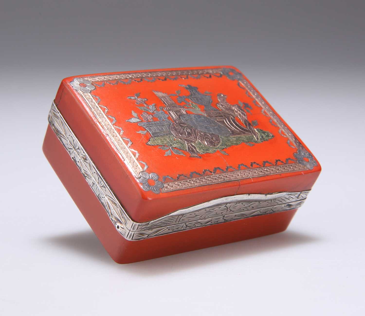 A LOUIS XVI SILVER-MOUNTED TRI-COLOUR GOLD INLAID RED LACQUER BOÎTE-À-MOUCHES, CIRCA 1775-80