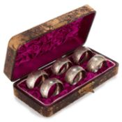 A SET OF SIX VICTORIAN SILVER NAPKIN RINGS