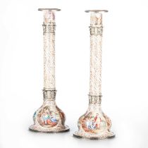 A FINE PAIR OF AUSTRIAN SILVER AND ENAMEL CANDLESTICKS