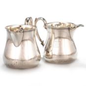 A PAIR OF VICTORIAN SILVER CREAM JUGS