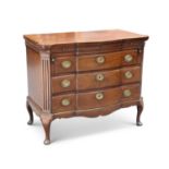 A MAHOGANY COMMODE