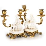 A PAIR OF ORMOLU-MOUNTED MINTON BISCUIT PORCELAIN FIGURES, FROM THE FIVE SENSES, CIRCA 1830