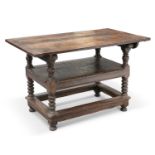 A 17TH CENTURY OAK MONKS BENCH