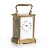 A FRENCH BRASS CARRIAGE CLOCK, CIRCA 1900