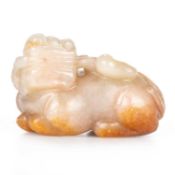 A CHINESE JADE CARVING OF A QILIN