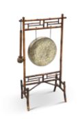 AN AESTHETIC BAMBOO AND BRASS DINNER GONG, LATE 19TH CENTURY