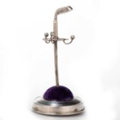 AN EDWARDIAN SILVER NOVELTY HATPIN STAND