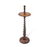 A 19TH CENTURY WALNUT CANDLESTAND