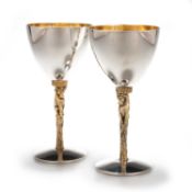 STUART DEVLIN: A PAIR OF SILVER AND SILVER-GILT TOTEM WINE GOBLETS