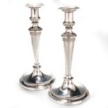 A PAIR OF GEORGE III SILVER CANDLESTICKS