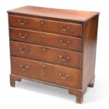 A GEORGE III OAK CHEST OF DRAWERS