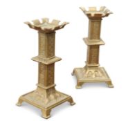 A PAIR OF GOTHIC REVIVAL BRASS CANDLESTICKS, LATE 19TH CENTURY