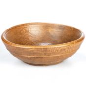 AN EARLY 19TH CENTURY TURNED ELM BOWL