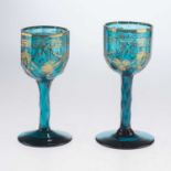 A NEAR PAIR OF GILDED TURQUOISE BLUE WINE GLASSES, 18TH CENTURY