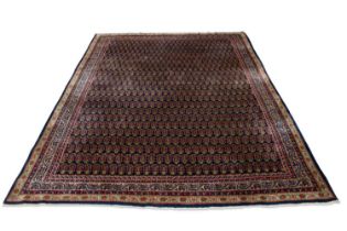 A PERSIAN SAROQ CARPET