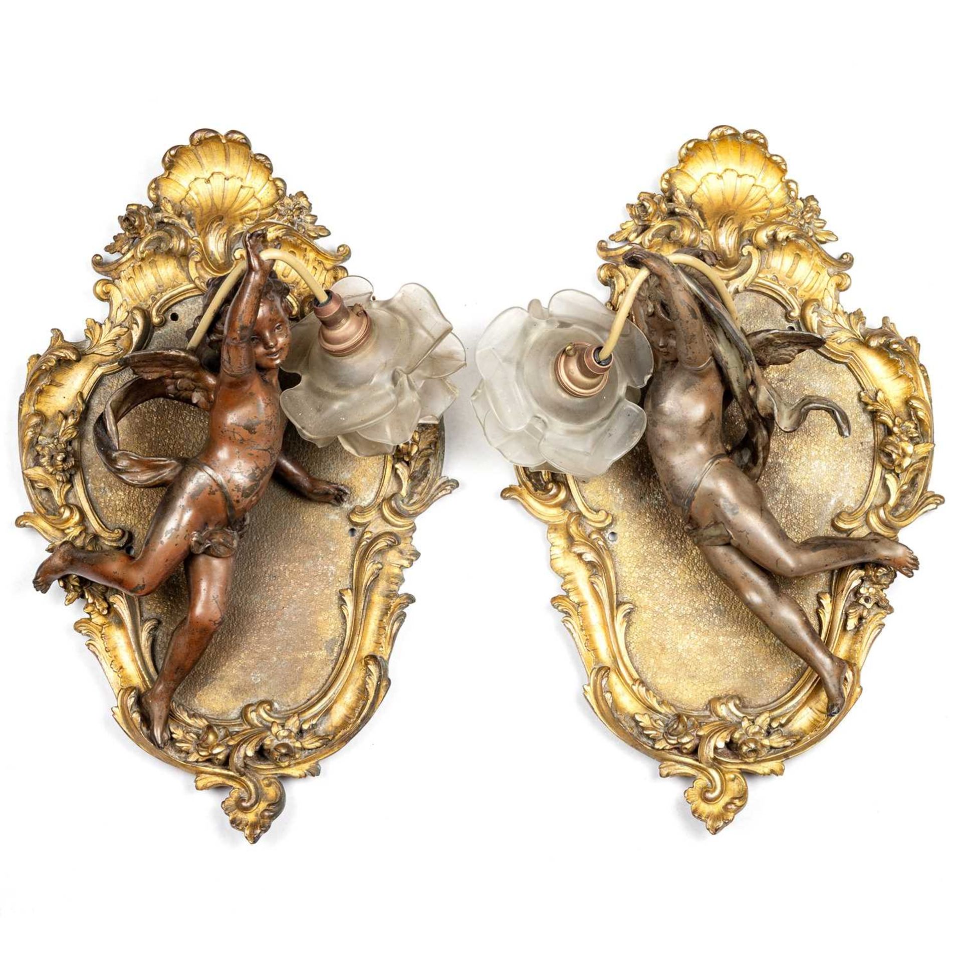 A PAIR OF 19TH CENTURY GILT-BRONZE PUTTI WALL LIGHTS, IN THE MANNER OF FRANCOIS LINKE (1855-1946)