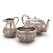 A LATE 19TH CENTURY INDIAN SILVER THREE-PIECE BACHELOR'S TEA SERVICE