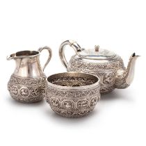 A LATE 19TH CENTURY INDIAN SILVER THREE-PIECE BACHELOR'S TEA SERVICE