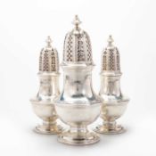 A GRADUATED SET OF THREE MID-18TH CENTURY SILVER CASTERS, POSSIBLY WEST INDIAN COLONIAL, CIRCA 1740