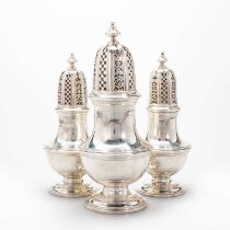 A GRADUATED SET OF THREE MID-18TH CENTURY SILVER CASTERS, POSSIBLY WEST INDIAN COLONIAL, CIRCA 1740