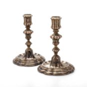 A PAIR OF 18TH CENTURY ITALIAN SILVER CANDLESTICKS