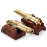 A PAIR OF BRASS MODEL DESK CANNONS