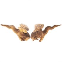 A PAIR OF 19TH CENTURY CARVED GILTWOOD DRAGONS