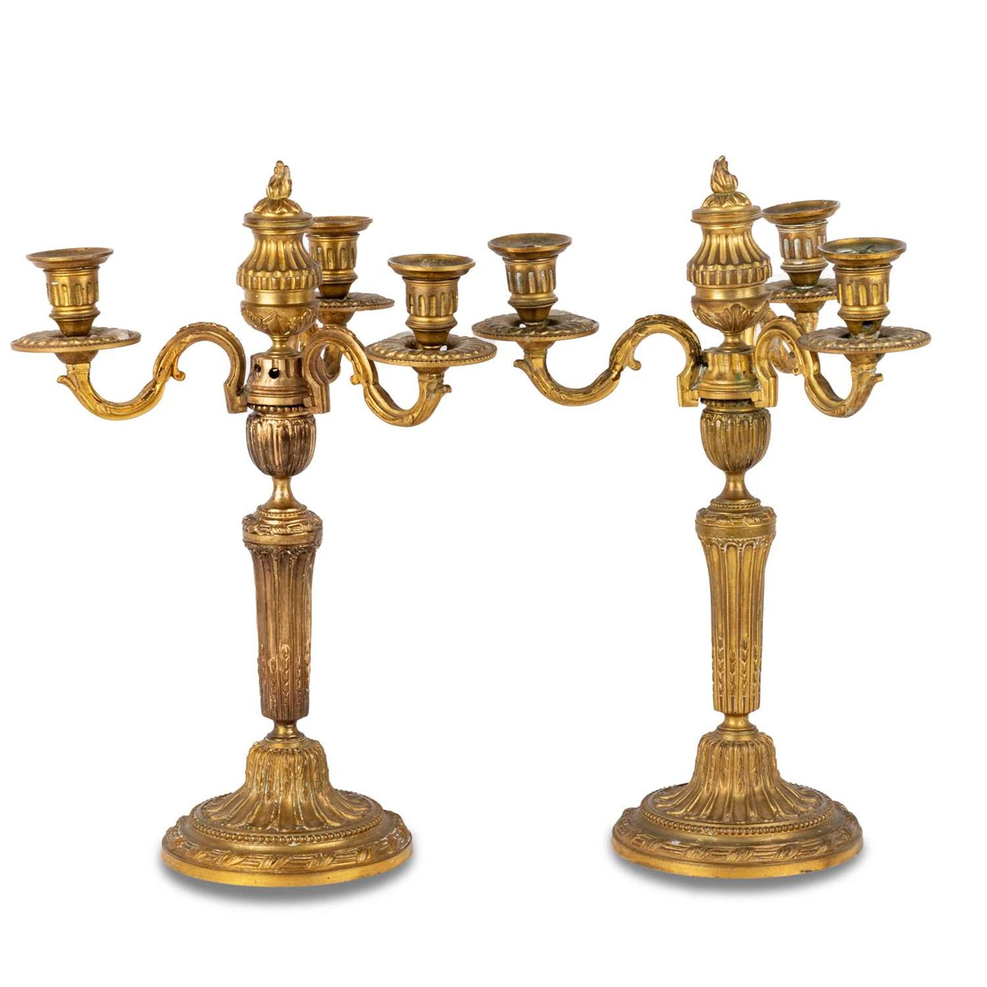 A PAIR OF LOUIS XVI STYLE GILT-BRONZE THREE-LIGHT CANDELABRA, 19TH CENTURY