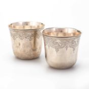 A PAIR OF 18TH CENTURY FRENCH SILVER STACKING BEAKERS