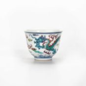 A CHINESE DOUCAI 'DRAGON' CUP