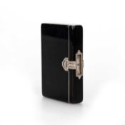 AN ART DECO GOLD BLACK ENAMEL AND DIAMOND COMPACT / NÉCESSAIRE, IN THE MANNER OF CARTIER