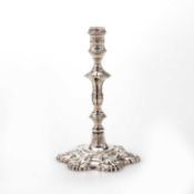 A GEORGE III SILVER TAPERSTICK