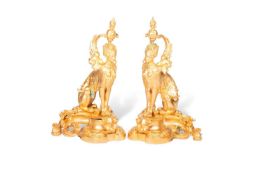 A PAIR OF FRENCH GILT-BRASS CHENETS