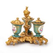 A SÈVRES PORCELAIN AND ORMOLU THREE-BOTTLE INKSTAND
