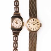 A LADY'S 9CT GOLD TISSOT BRACELET WATCH AND ANOTHER GOLD WATCH