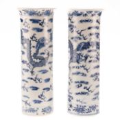 A PAIR OF CHINESE BLUE AND WHITE SLEEVE VASES, 19TH CENTURY