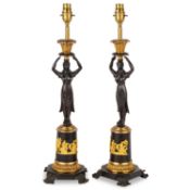 A PAIR OF EMPIRE STYLE GILT AND PATINATED BRONZE FIGURAL CANDLESTICKS, 19TH CENTURY