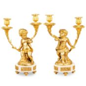 A PAIR OF LOUIS XVI STYLE GILT-BRONZE AND MARBLE FIGURAL TWO-LIGHT CANDELABRA After models by Claude