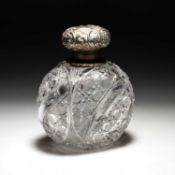 A VICTORIAN SILVER-MOUNTED CUT-GLASS SCENT BOTTLE