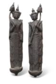 A LARGE PAIR OF CARVED WOOD FIGURES OF BUDDHAS, 19TH CENTURY OR EARLIER