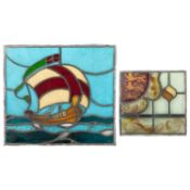 AN ARTS AND CRAFTS LEADED AND STAINED GLASS PANEL