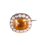 A MID-19TH CENTURY CITRINE AND SPLIT PEARL BROOCH