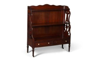 A REGENCY MAHOGANY WATERFALL BOOKCASE