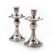 A PAIR OF WMF SILVER-PLATED CANDLESTICKS
